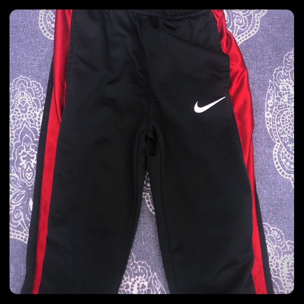 2 pairs of boys Nike athletic pants